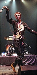 Pete Doherty performing with Babyshambles