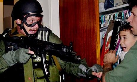 Elian-Gonzalez-held-by-Do-001.jpg