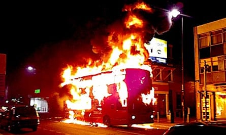 A bus on fire during the Tottenham riots