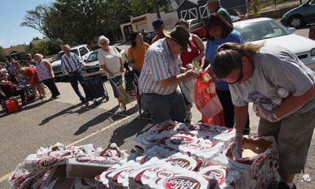 Volunteers hand out free groceries to locals in Pueblo, Colorado