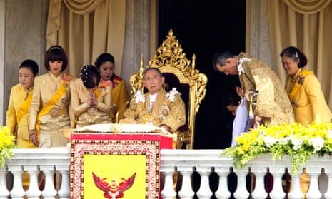 Thai King Bhumibol Adulyadej of Thailand surrounded by his family members