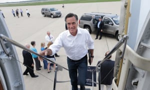 Mitt Romney boards his charter plane in Kansas City