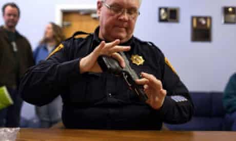 Oregon police handles a gun