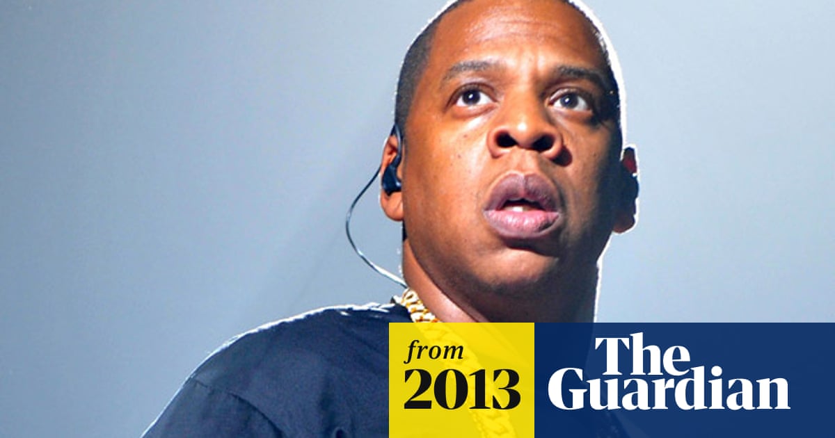 Jay Z leaves London Underground station on way to O2 arena - video