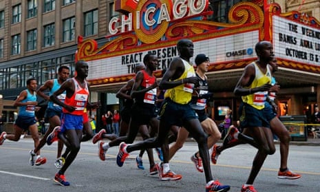 Dennis Kimetto of Kenya runs through the streets during the Chicago marathon