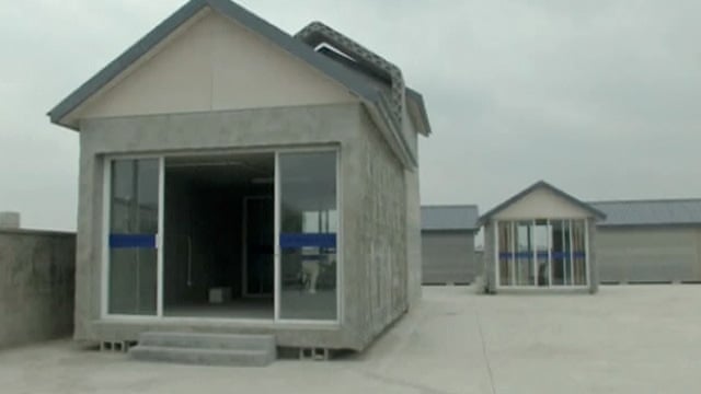 3d Printer Builds Houses In China Video Technology The Guardian