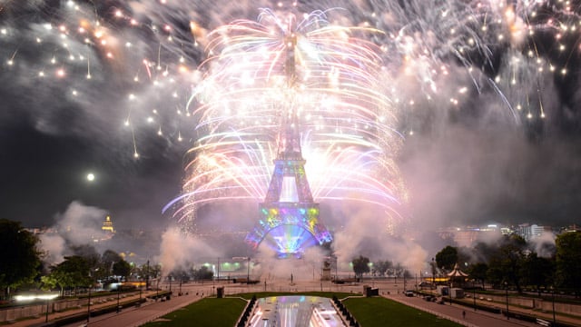 Eiffel Tower lit up by fireworks for Bastille Day â video
