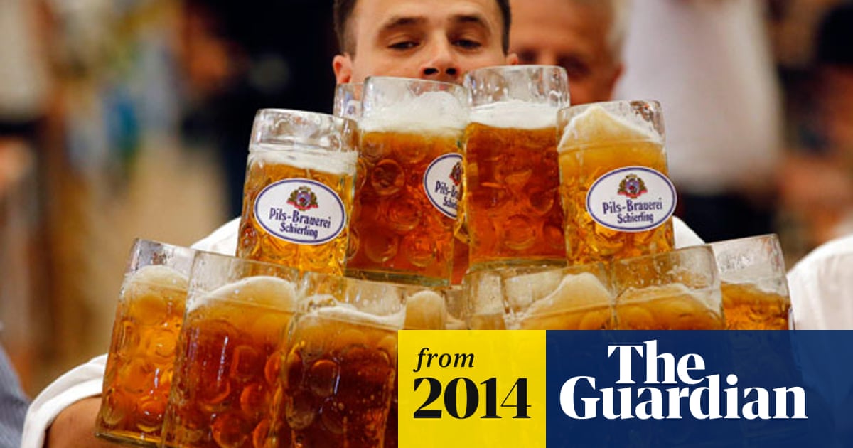 German Waiter Breaks Beer Carrying Record Video World News The Guardian