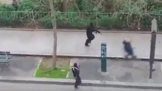 Charlie Hebdo Magazine Attack Vigils Held As French Hunt Suspects As It Happened World News The Guardian