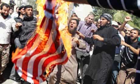Islamist Salafis set fire to a U.S. flag in Amman