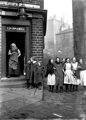 Press photography: Women passing Popplewell’s grocery shop on Seymour Street, Bradford, 1910 