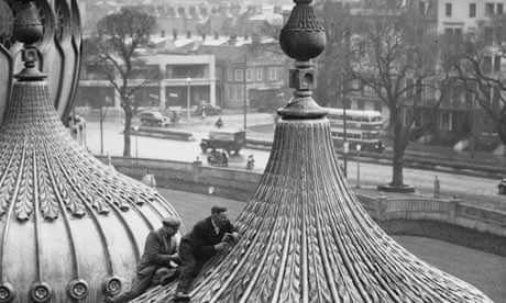 Stonemasons work on the domed roof of the Royal Pavilion in Brighton.