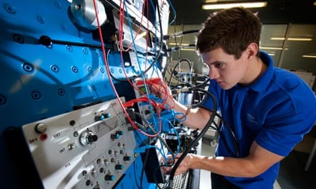 Apprentice working with electronics