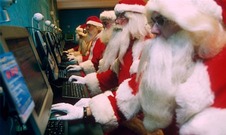 Santas on computers at Virgin Megastore