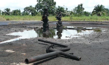 The oil wellhead near the village of K-dere, Ogoniland, Niger, Delta.