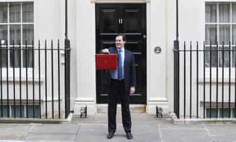 Chancellor of the Exchequer George Osborne holds up his red Ministerial Box at 11 Downing Street