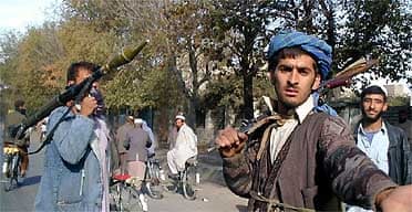 Northern Alliance fighters patrol streets of Kabul