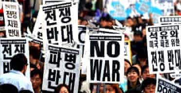 Anti-war protesters march in Seoul, South Korea