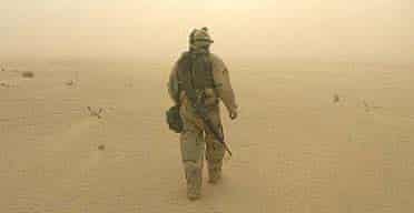 Cpl Bryan Beard on duty in a sandstorm near the army 1st Battalion, 3rd Infantry Division in southern Iraq