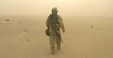 Cpl Bryan Beard on duty in a sandstorm near the army 1st Battalion, 3rd Infantry Division in southern Iraq