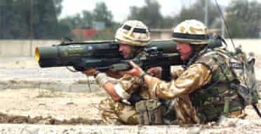 Irish Guards aim at targets as they continue to push against Iraqi loyalists in Basra 