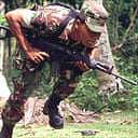 Indonesian soldier during a gunfight in Lampuku, Aceh province