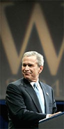 George Bush smiles as he delivers his victory speech during an event in Washington
