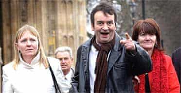 Gerry Conlon, who was jailed for the Guildford pub bombings of 1974, outside parliament with his family