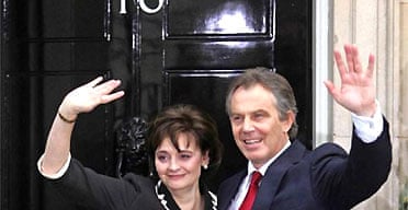 Tony Blair and his wife, Cherie, arrive back at Downing Street after winning the 2005 election