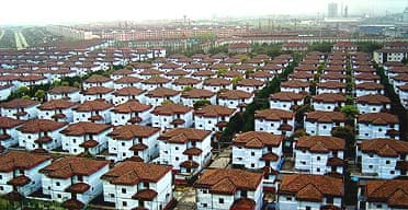 Rows of new houses illustrate the wealth - and uniformity - of Huaxi in China