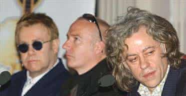 Sir Elton John, Midge Ure and Sir Bob Geldof during a press conference for Live 8