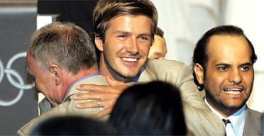 David Beckham hugs the London mayor, Ken Livingstone, following the announcement that London will host the 2012 Summer Olympic games