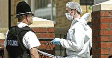Police search the home of one of the suspected bombers in Colwyn Road, Leeds