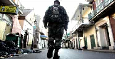 A soldier patrolling Bourbon Street in the French Quarter of New Orleans
