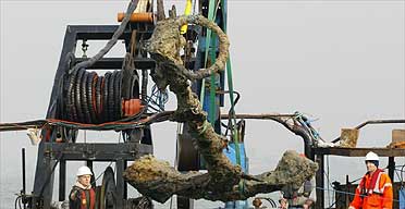 The anchor from King Henry VIII's flagship the Mary Rose, which foundered off Portsmouth in 1545, is lifted out of the Solent