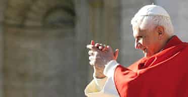 Pope Benedict XVI blesses pilgrims during his weekly general audience in St Peter's Square at the Vatican