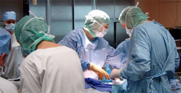 French surgeons perform the world's first partial face transplant on a 38-year-old woman in Amiens 