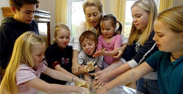 Ursula von der Leyen with her children. She wants fathers to help more with childcare. Photograph: Jochen Luebke/AFP