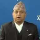 King Gyanendra of Nepal announces the reinstatement of parliament. Photograph: Reuters