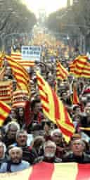 Catalan nationalists march in Barcelona in support of greater autonomy for their region from Madrid. Photograph: Manu Fernandez/AP 