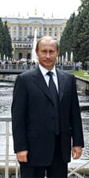 Russian premier Vladimir Putin stands outside Peterhof, an opulent St Petersburg estate. Photograph: Itar Tass/AP