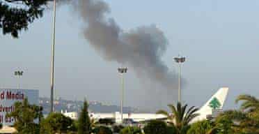 Smoke rises from Beirut international airport after being hit by Israeli planes
