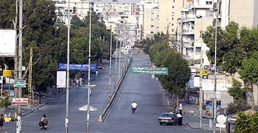 Streets are empty in many parts of Beirut, but some are trying to carry on as normal.