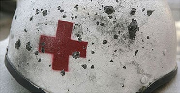 The helmet of a Red Cross volunteer injured when Israeli rockets hit his ambulance in Tyre