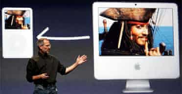 Apple CEO Steve Jobs announces the new video download service from iTunes during an event in San Francisco. Photograph: Justin Sullivan/Getty