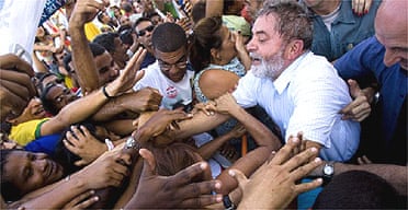 Luiz In&atilde;cio Lula da Silva greets supporters during a rally in Bahia