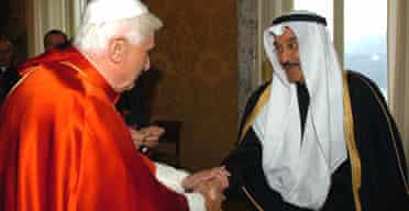 Pope Benedict XVI shakes hands with the Kuwaiti ambassador to the Holy See, Ahamad Abdulkareem Al-Ibrahim