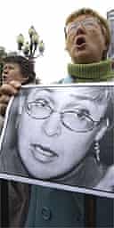 Protesters demonstrate against the murder of Anna Politkovskaya