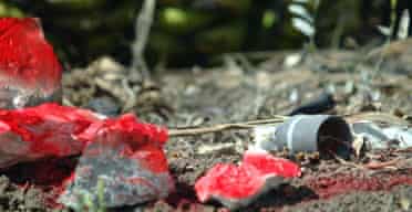 The location of an Israeli cluster bomb is marked with red paint near the village of El Maalliye in southern Lebanon
