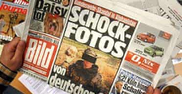 A copy of Bild, which carried the pictures of the German soldiers posing with a human skull